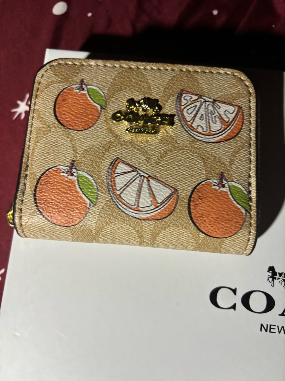Coach Tan Signature Canvas Wallet with Orange Fruit Motif